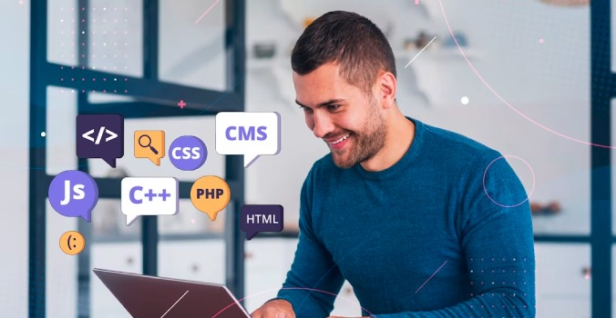 A male person using javascript, css, c++, php, cms and html for web app development